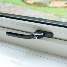 Load image into Gallery viewer, Black uPVC Casement Window Locking Handle on White uPVC window, buy now at Anglian Home Improvements
